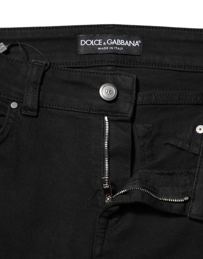 Jeans de mezclilla ajustados de tiro medio con logo de algodón negro Dolce & Gabbana