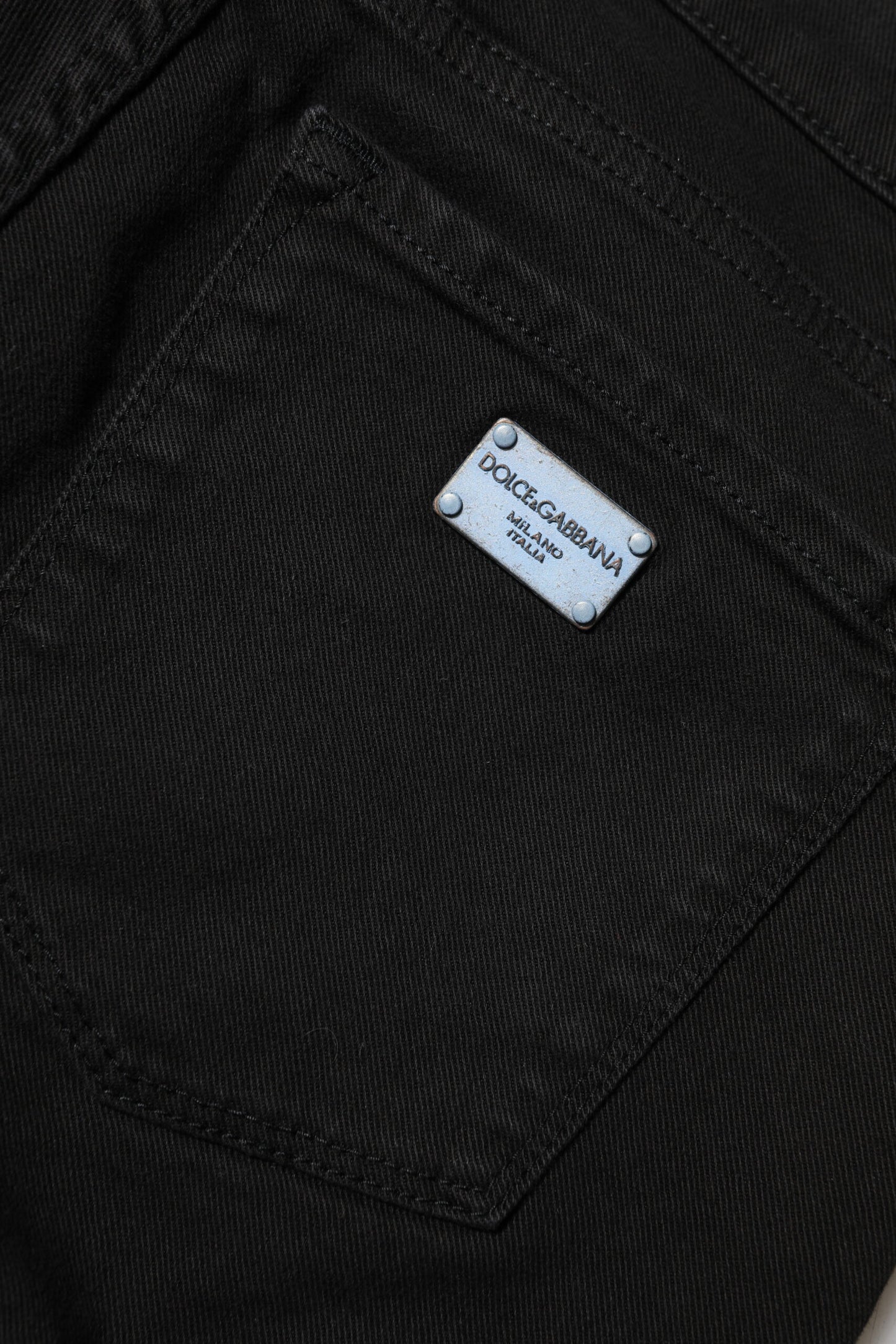 Jeans de mezclilla ajustados de tiro medio con logo de algodón negro Dolce & Gabbana