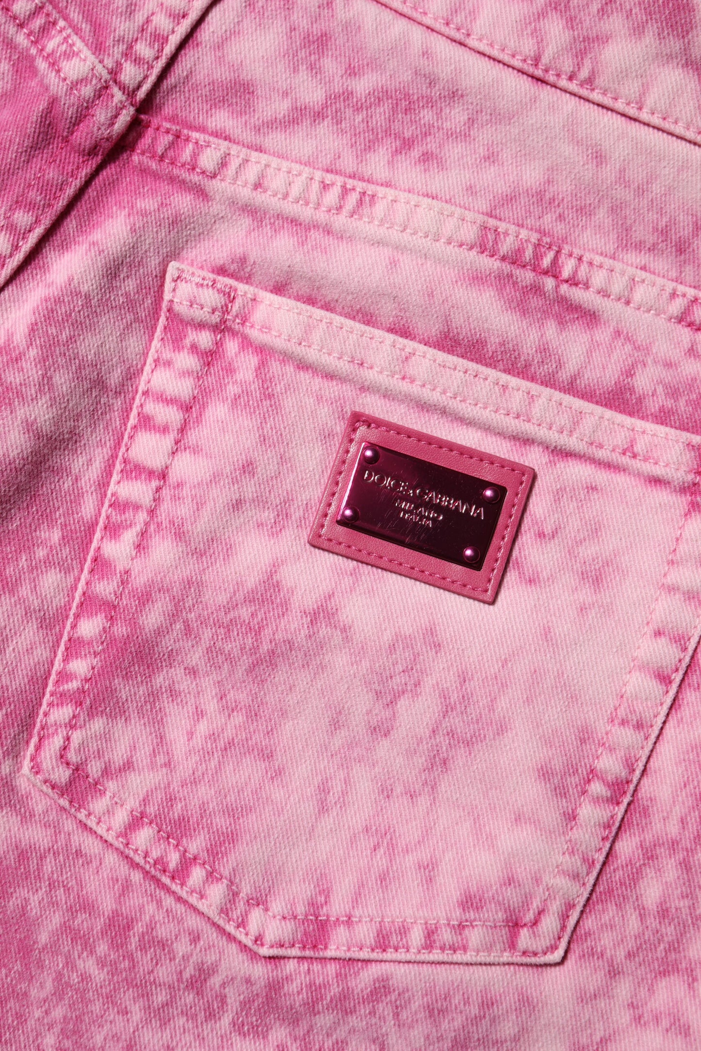 Jeans vaqueros cónicos de talle alto teñido anudado rosas de Dolce & Gabbana