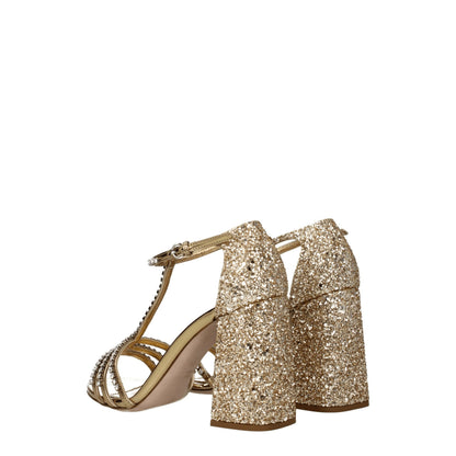 Sandalias de plataforma Miu Miu de plástico dorado