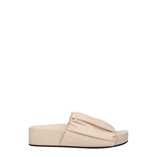 Pantuflas Jil Sander de cuero rosa