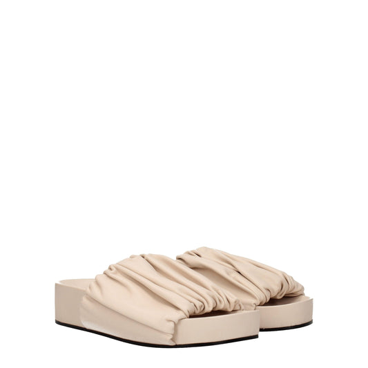 Pantuflas Jil Sander de cuero rosa