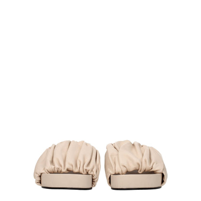 Pantuflas Jil Sander de cuero rosa
