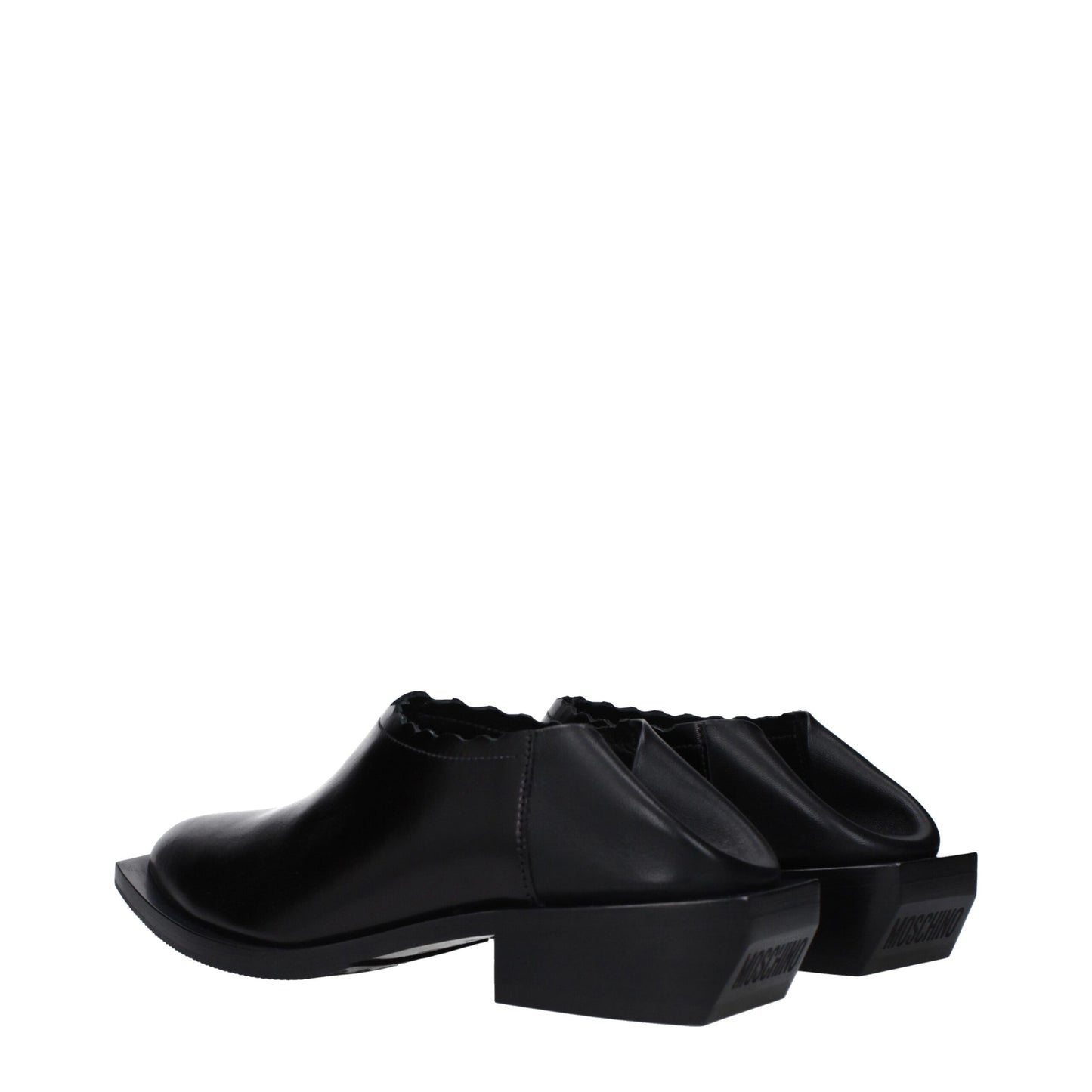 Mules de cuero negro Moschino