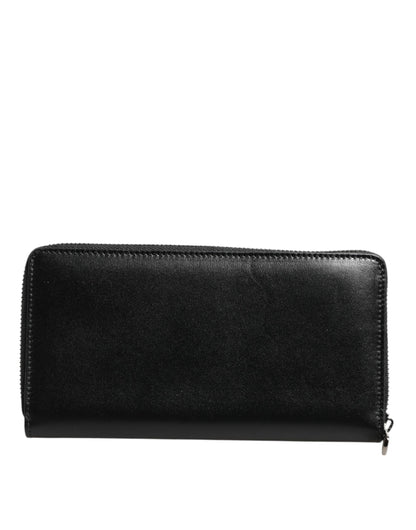 Cartera continental Dolce & Gabbana de cuero negro con cremallera y placa DG