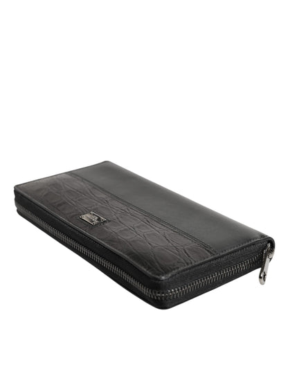 Cartera continental Dolce & Gabbana de cuero negro con cremallera y placa DG