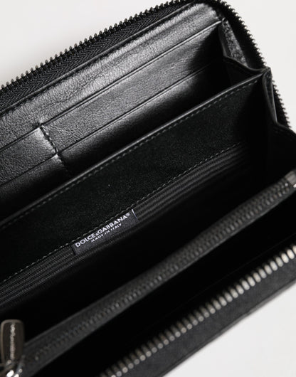Cartera continental Dolce & Gabbana de cuero negro con cremallera y placa DG
