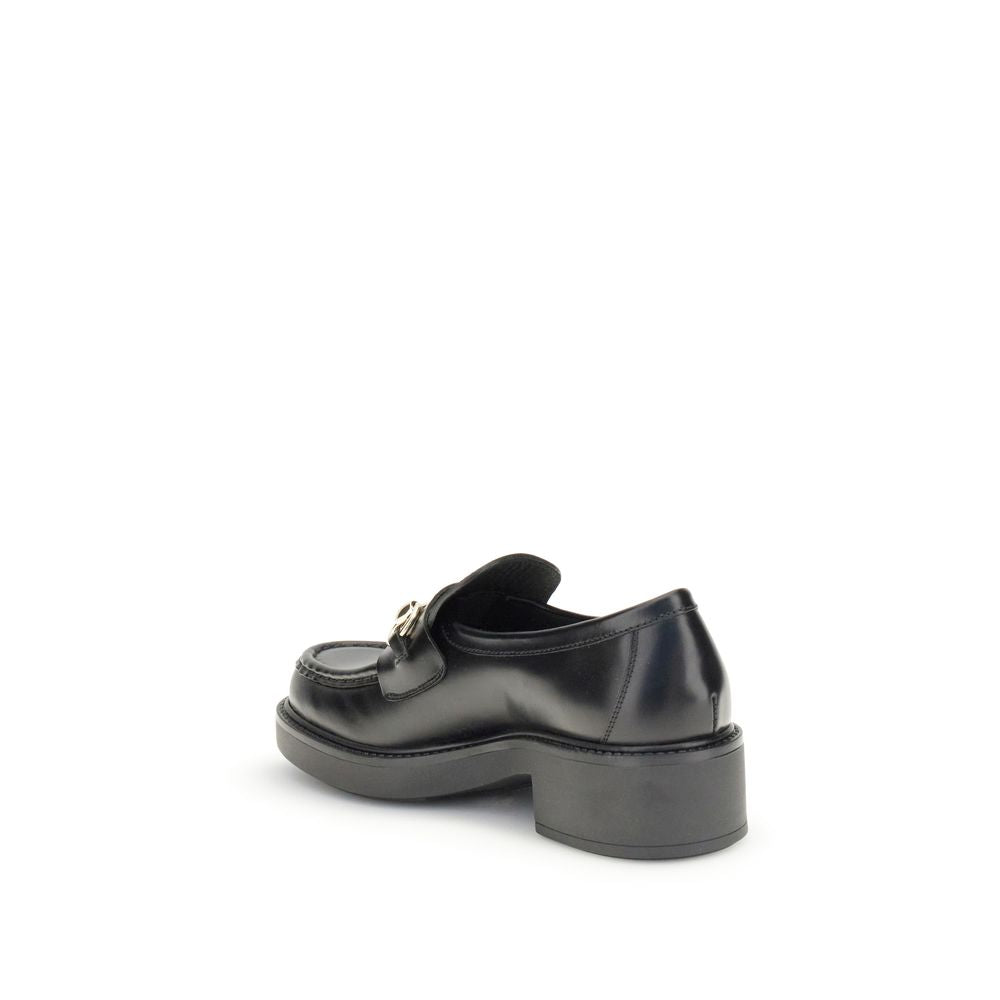 Mocassins Gucci en cuir de veau noir Bos Taurus