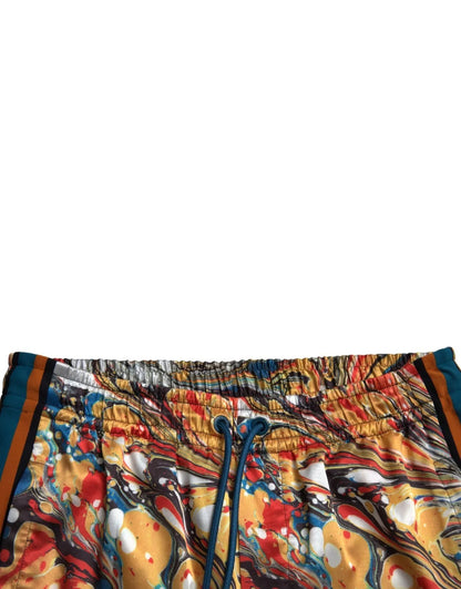 Pantalón de satén con estampado de mármol multicolor de Dolce & Gabbana