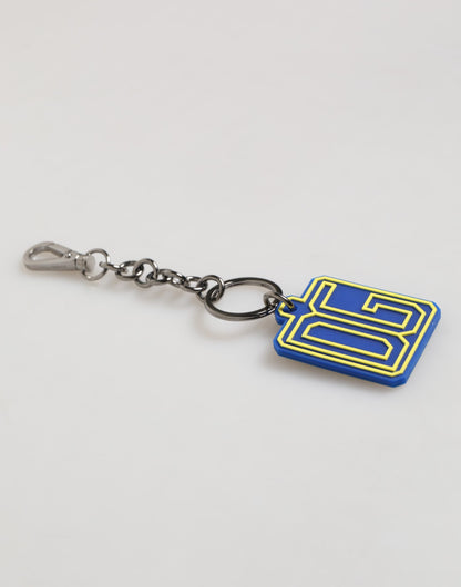 Dolce & Gabbana Llavero para hombre, de plata, con logotipo de goma DG, azul y amarillo