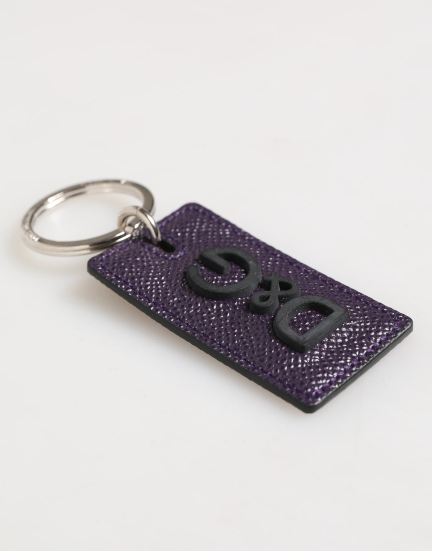 Dolce & Gabbana Llavero de metal con logo de cuero violeta para hombre