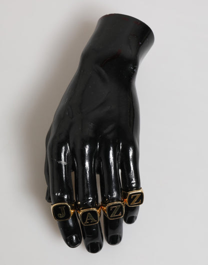 Anillo ajustable de 4 piezas con letras JAZZ de latón dorado de Dolce & Gabbana