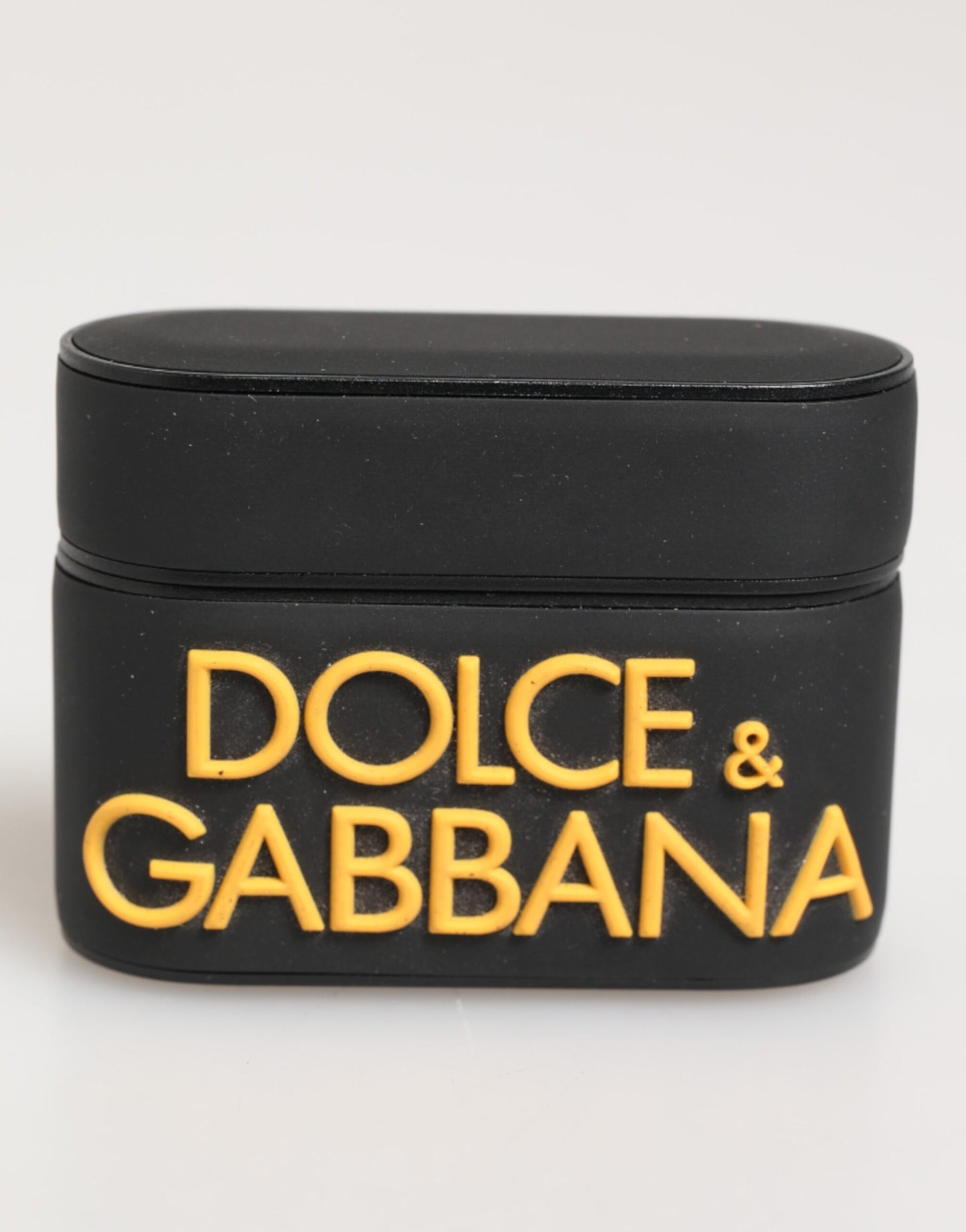 Funda para AirPods Dolce & Gabbana negra y amarilla de caucho con logotipo en relieve