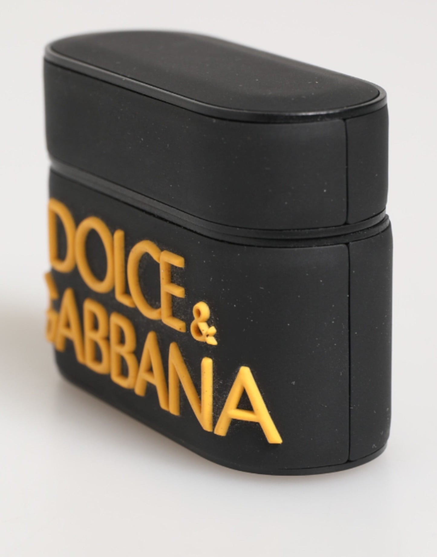 Funda para AirPods Dolce & Gabbana negra y amarilla de caucho con logotipo en relieve