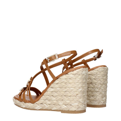 Sandalias de cuña de cuero marrón Stuart Weitzman