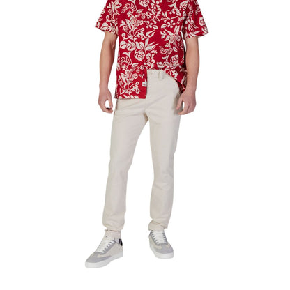 Pantalones ajustados Tommy Hilfiger de mezclilla beige de algodón