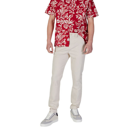 Pantalones ajustados Tommy Hilfiger de mezclilla beige de algodón