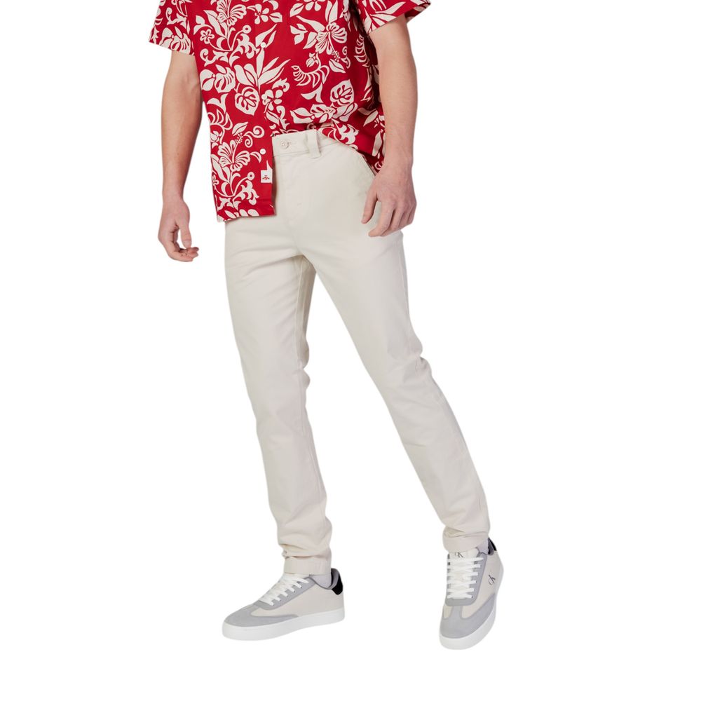 Pantalones ajustados Tommy Hilfiger de mezclilla beige de algodón