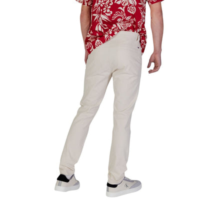 Pantalones ajustados Tommy Hilfiger de mezclilla beige de algodón